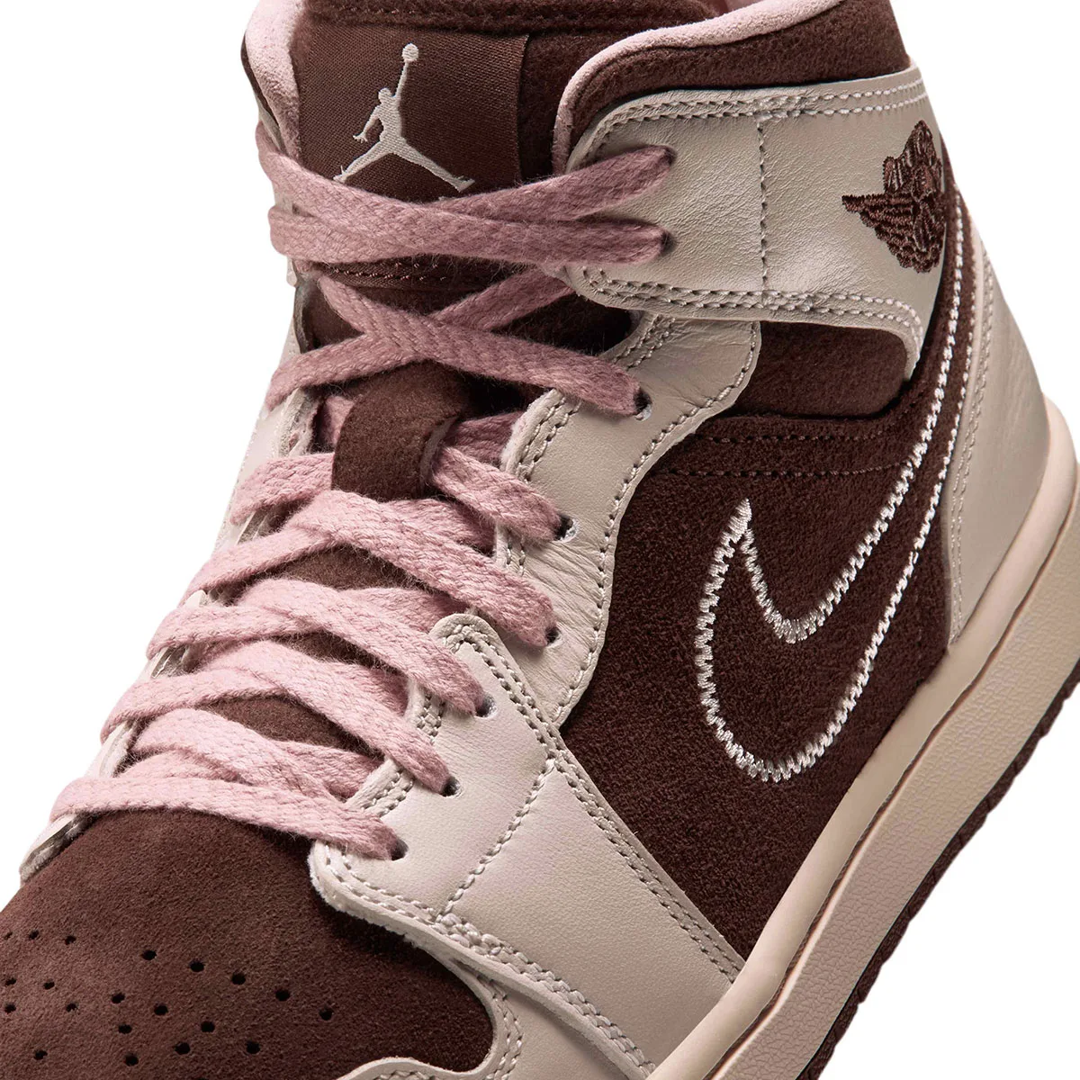 close-up of toe box with pink laces, Jumpman tag and wing logo, Cacao Wow/Rust Pink