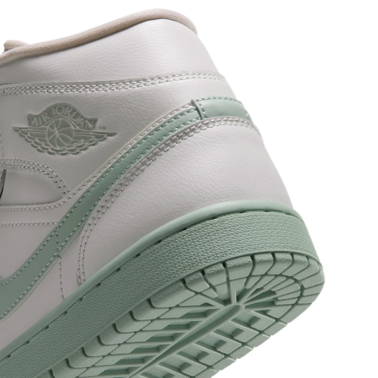 close-up of heel, embossed air jordan wings logo and mint sole tread, Pistachio Frost