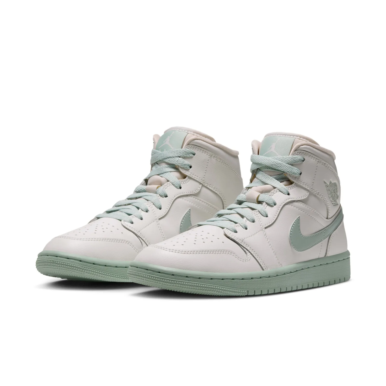 pair at an angle, cream uppers with mint swooshes and mint outsoles, Pistachio Frost