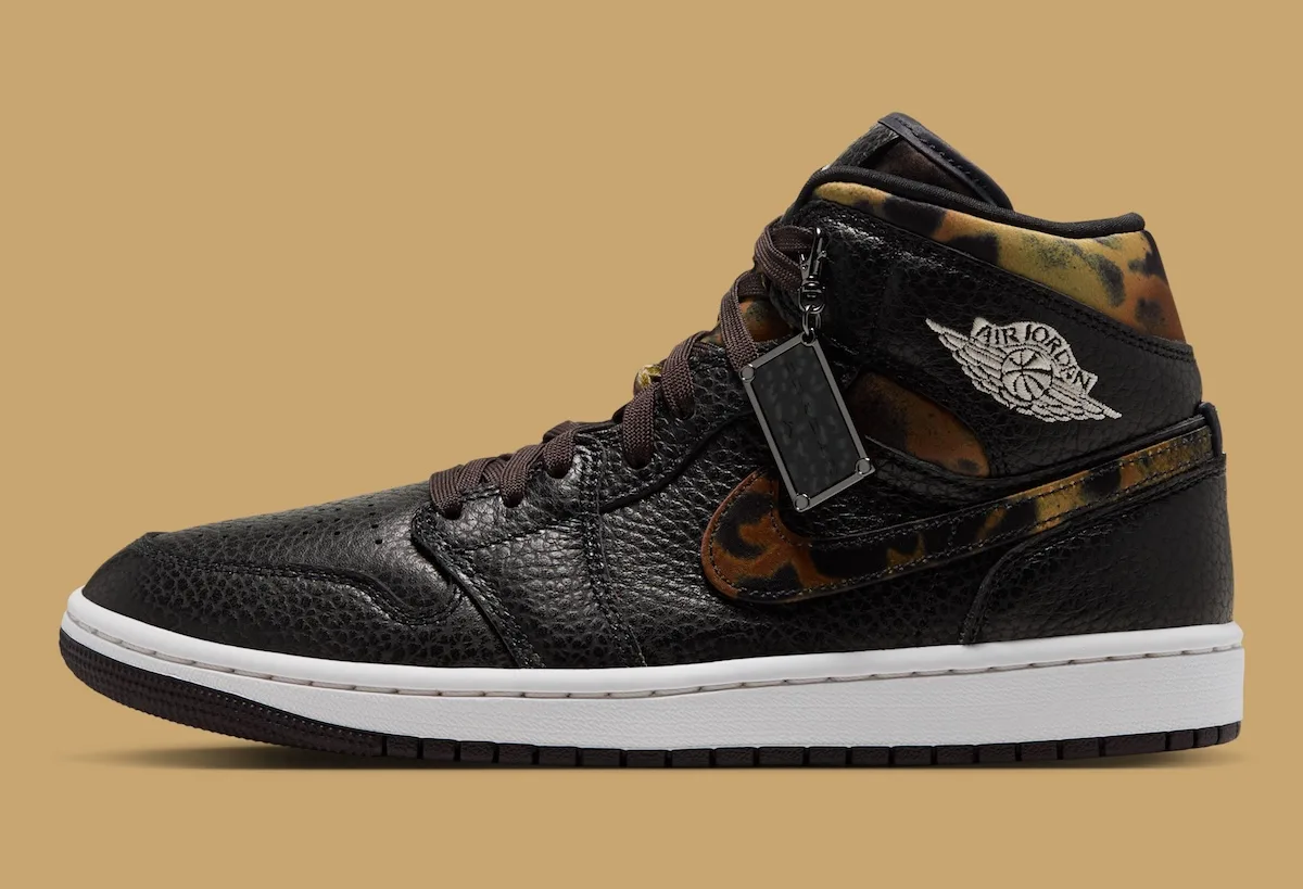 lateral view, black pebbled leather with leopard-print overlay on Swoosh, Velvet Brown Leopard