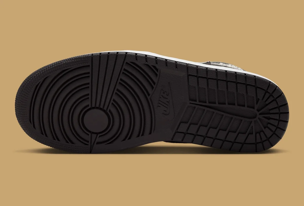 outsole view, black rubber Jumpman tread pattern with white midsole edge, Velvet Brown Leopard