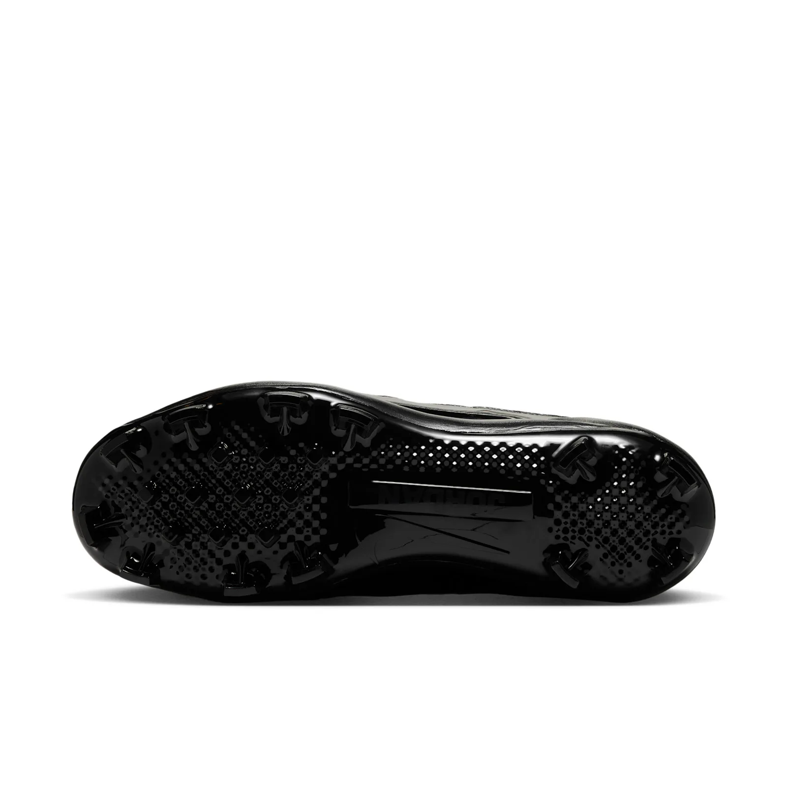 outsole view showing black molded cleats and traction pattern, MCS Baseball Cleat
