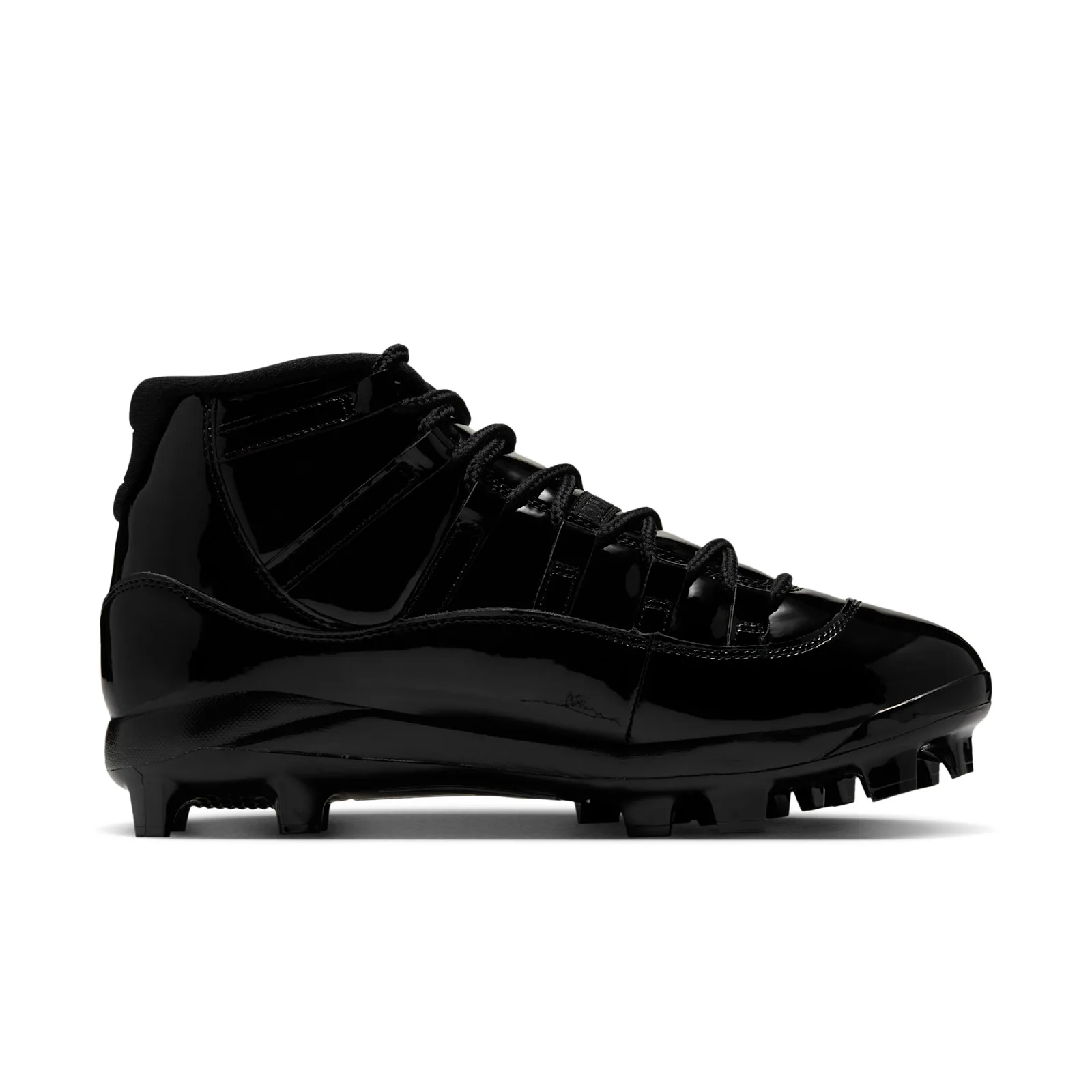 medial side view, all-black patent leather upper with black laces, MCS Baseball Cleat