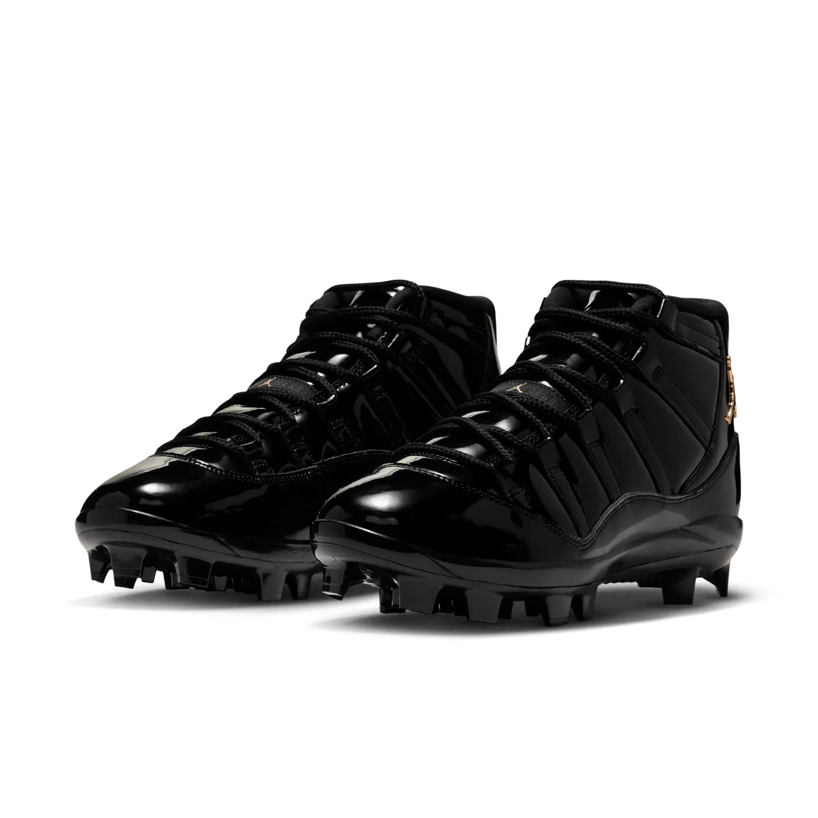 three-quarter pair view, black patent leather with gold zipper pull, MCS Baseball Cleat