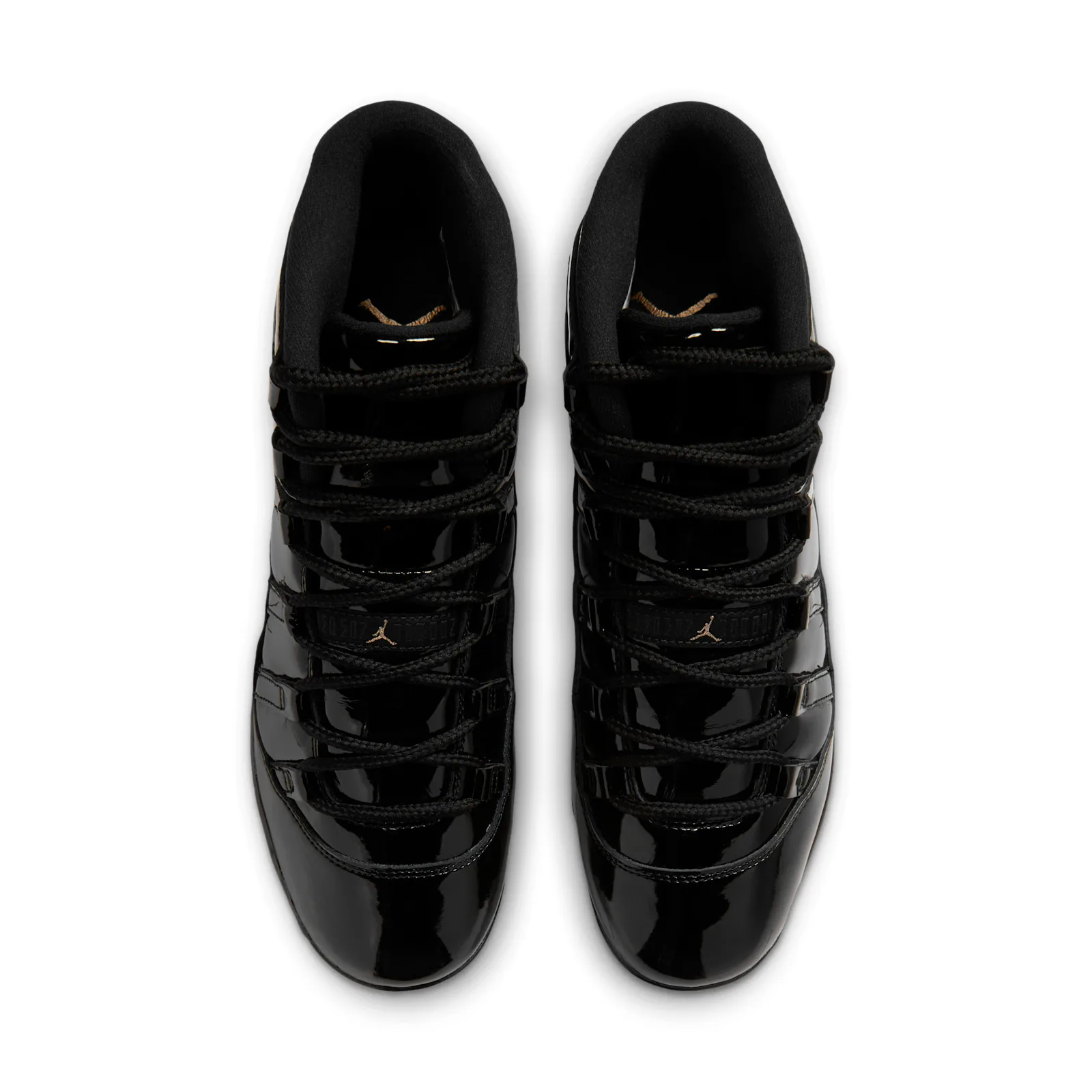 top-down pair view of black patent leather uppers with crossed laces, MCS Baseball Cleat