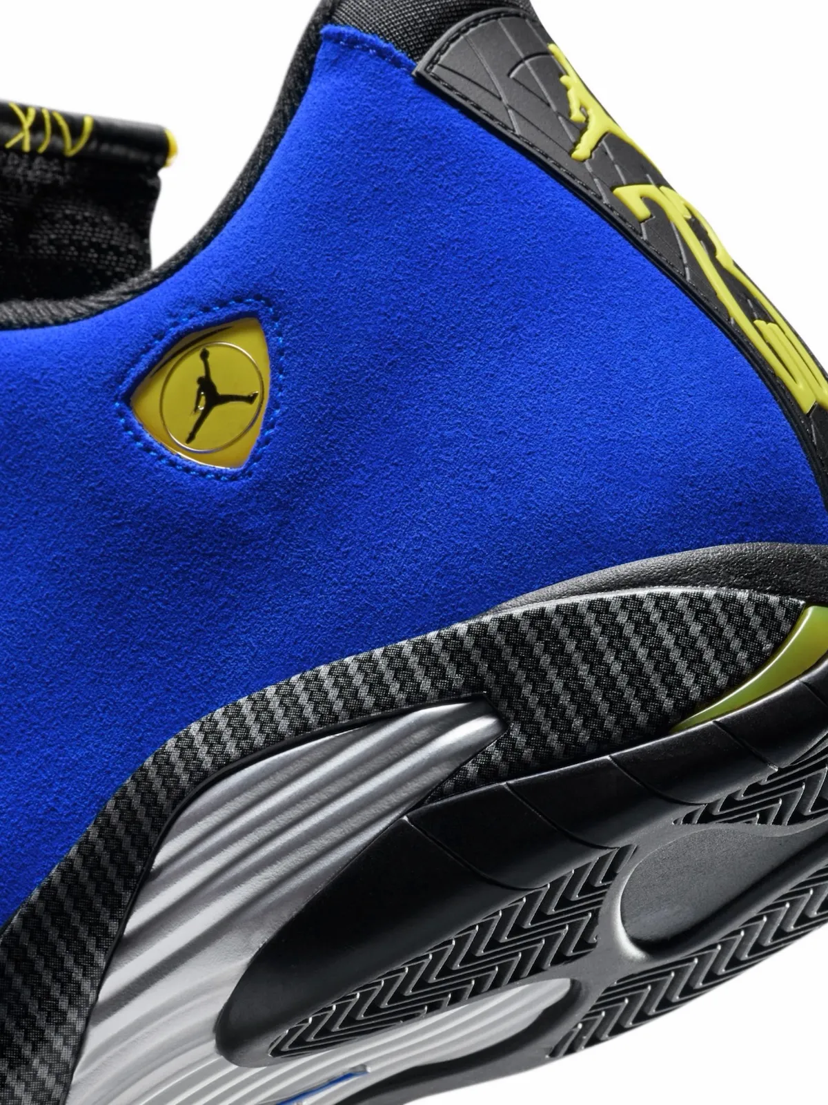 close-up of toe box showing yellow Jumpman shield emblem and stitching, Blue Ferrari