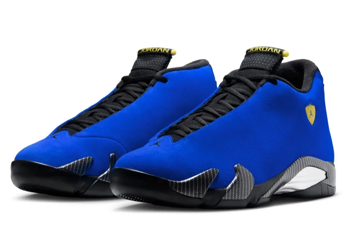pair at angle showing lateral sides and carbon-fibre mudguards, Blue Ferrari