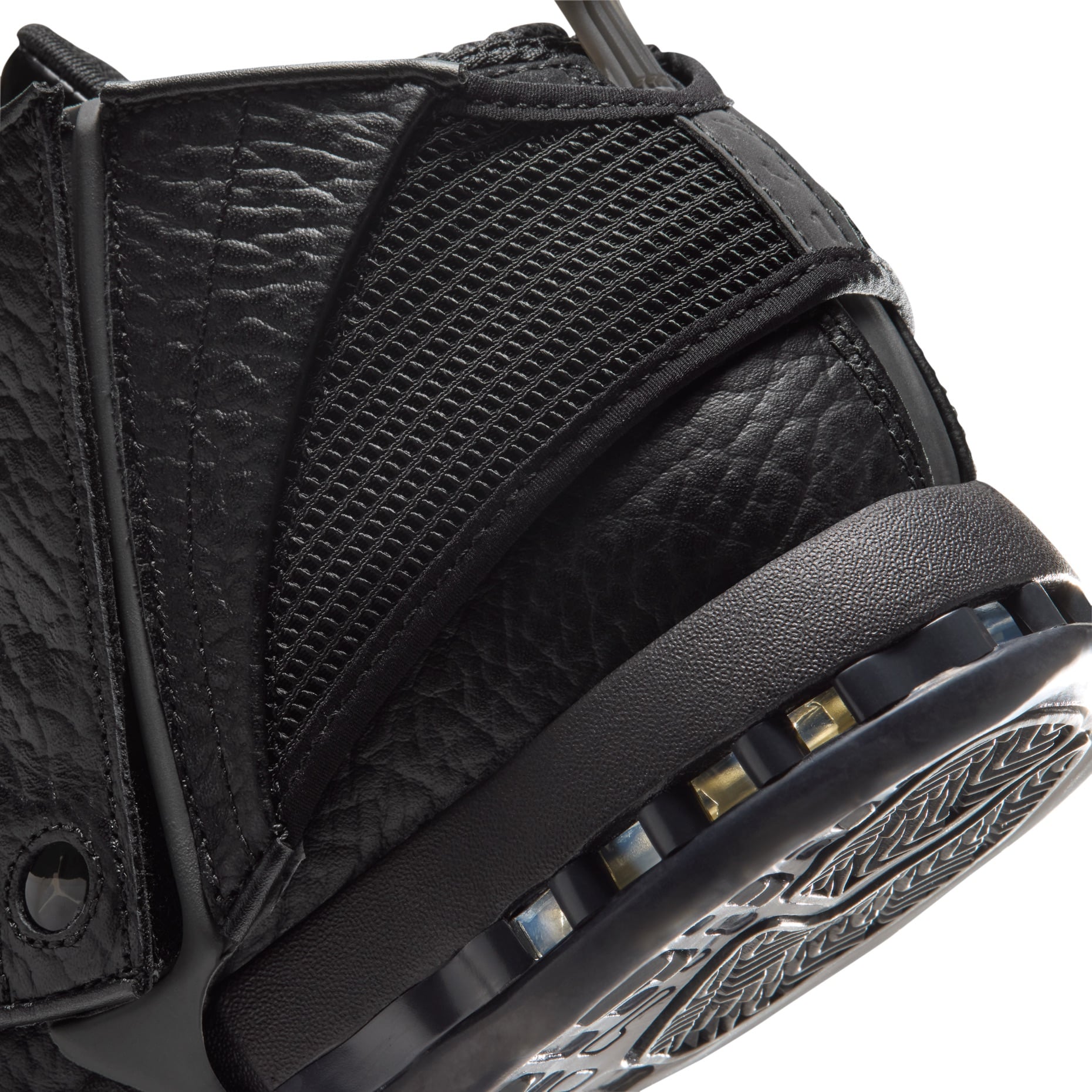 close-up heel and outsole detail, black leather with studded translucent sole, Black Pack
