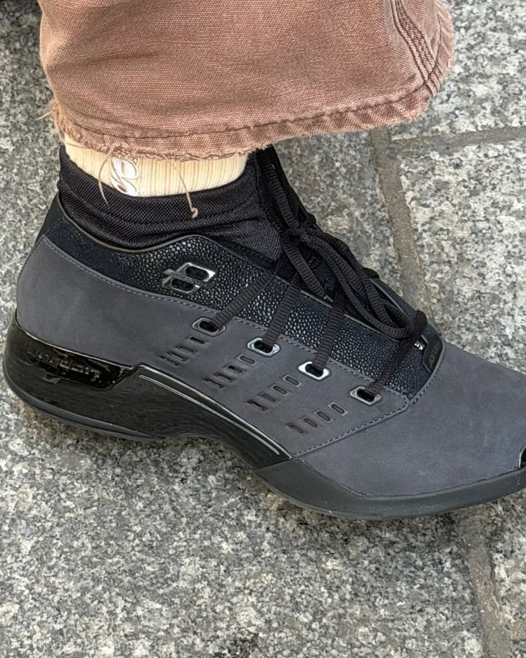 on-foot side view with black socks and rolled brown trousers, grey nubuck upper, Black Pack