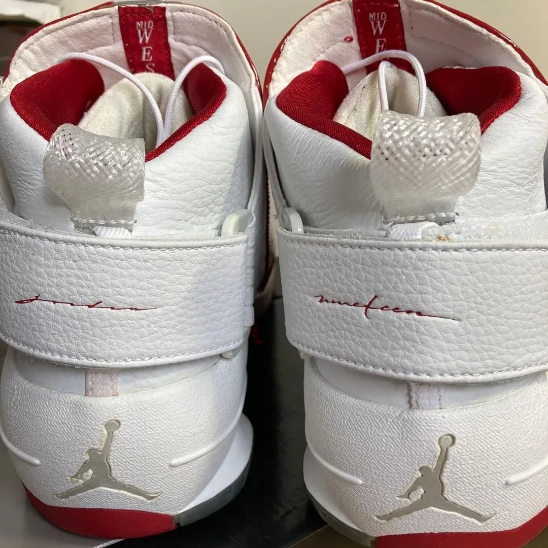 close heel pair, red 'jordan' and 'nineteen' script, silver Jumpman logos, Midwest