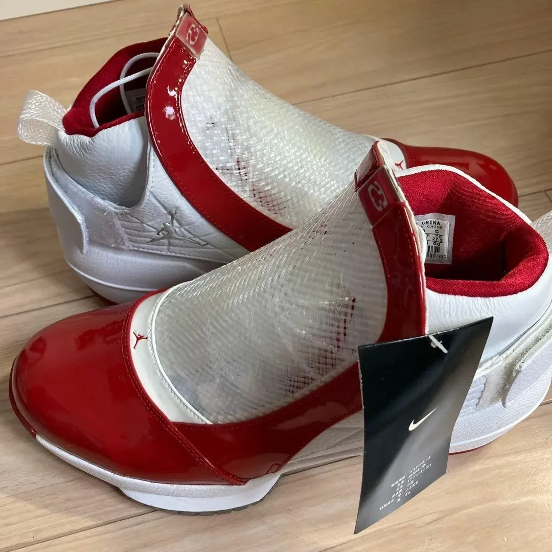 close angled pair, red patent uppers, white mesh tongues, size tag visible, Midwest