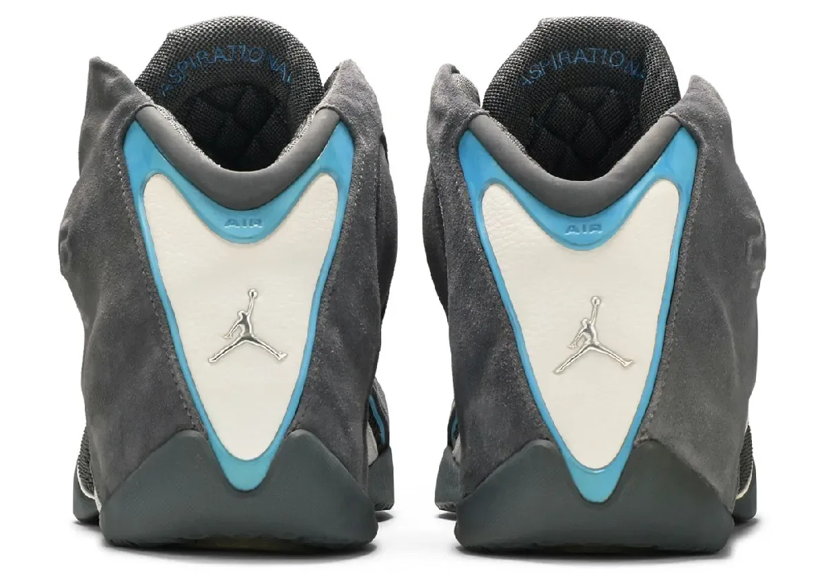 heel view of pair, blue and white panel with silver Jumpman, ASPIRATIONAL text on liner, Light Graphite