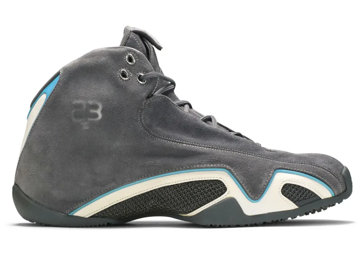 lateral close-up, embossed 23 logo on grey suede with blue piping, Light Graphite