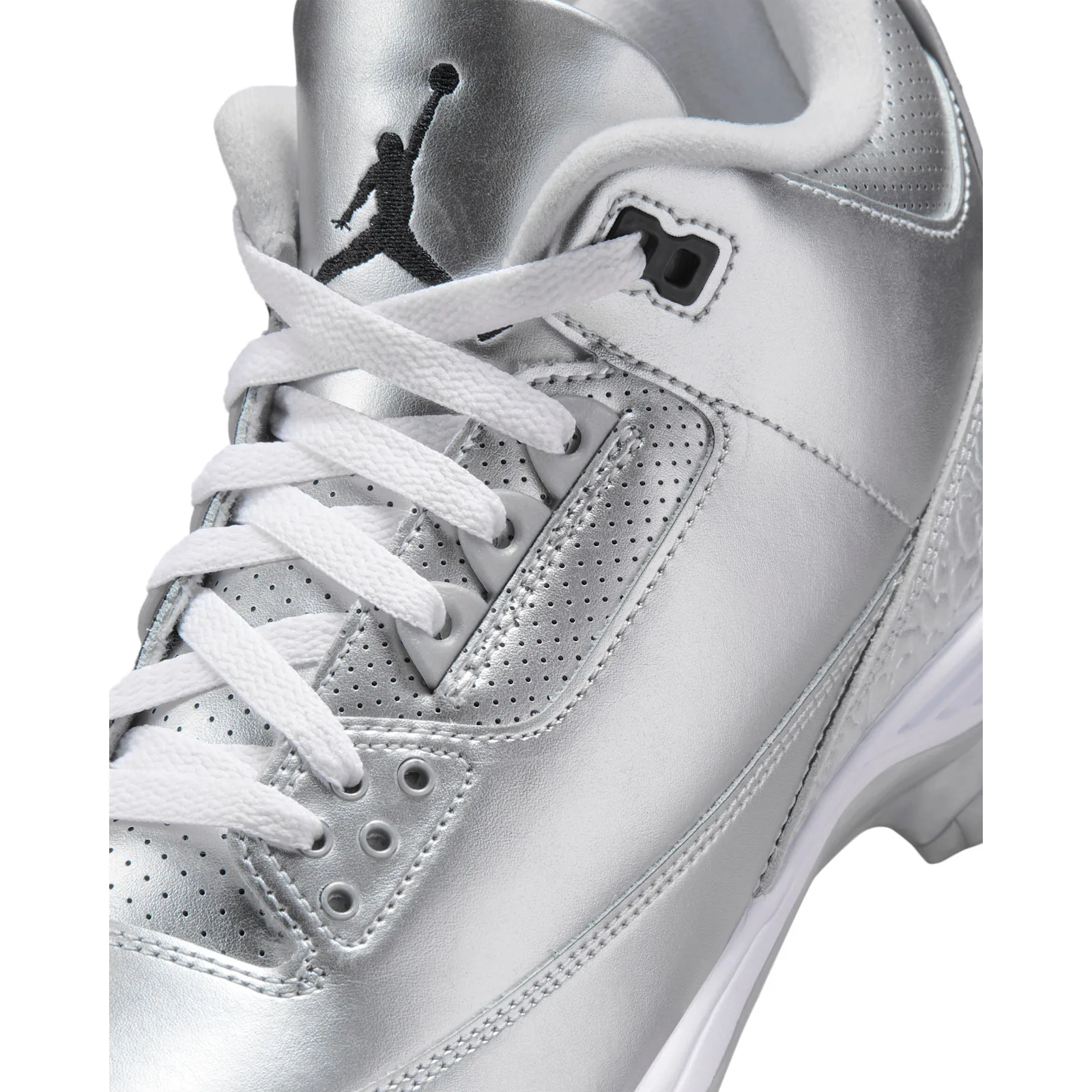 close-up of eyelets, white laces and Jumpman embroidery on tongue, Metallic Silver