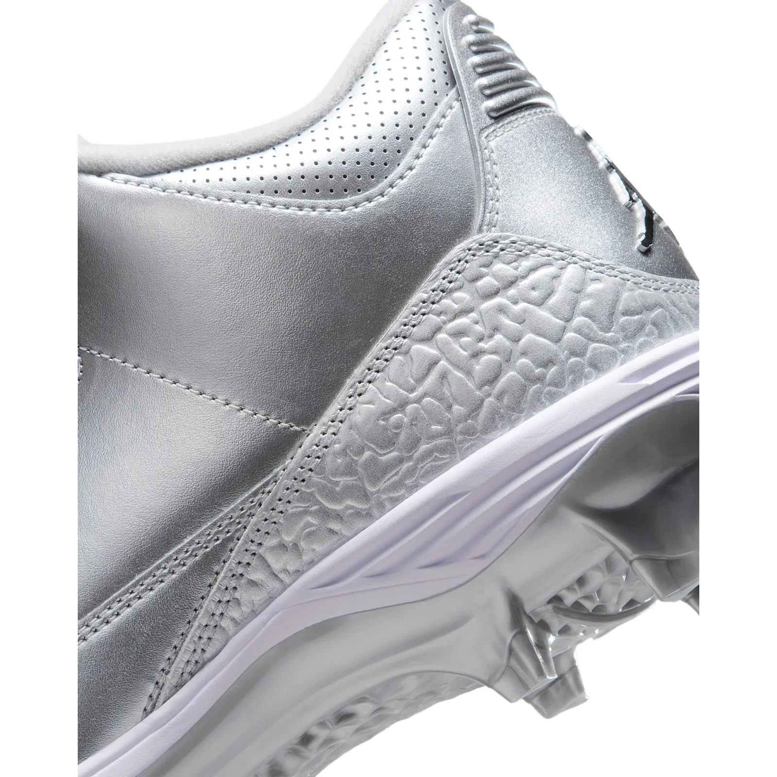 close-up of heel and elephant print texture with white midsole and cleats, Metallic Silver