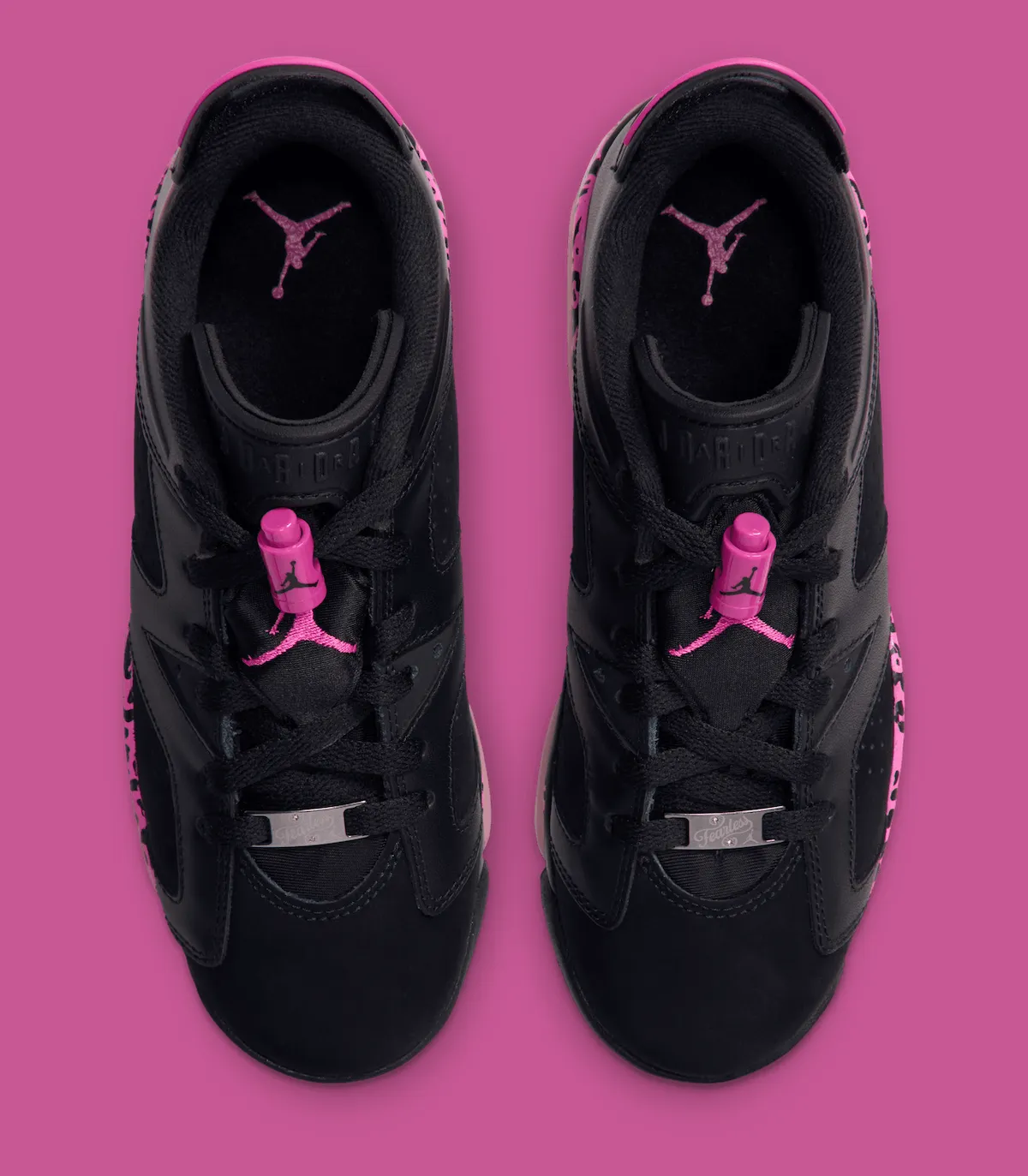 top-down pair view showing pink Jumpman on tongue pulls and pink leopard heel print, Jordan 6 Low