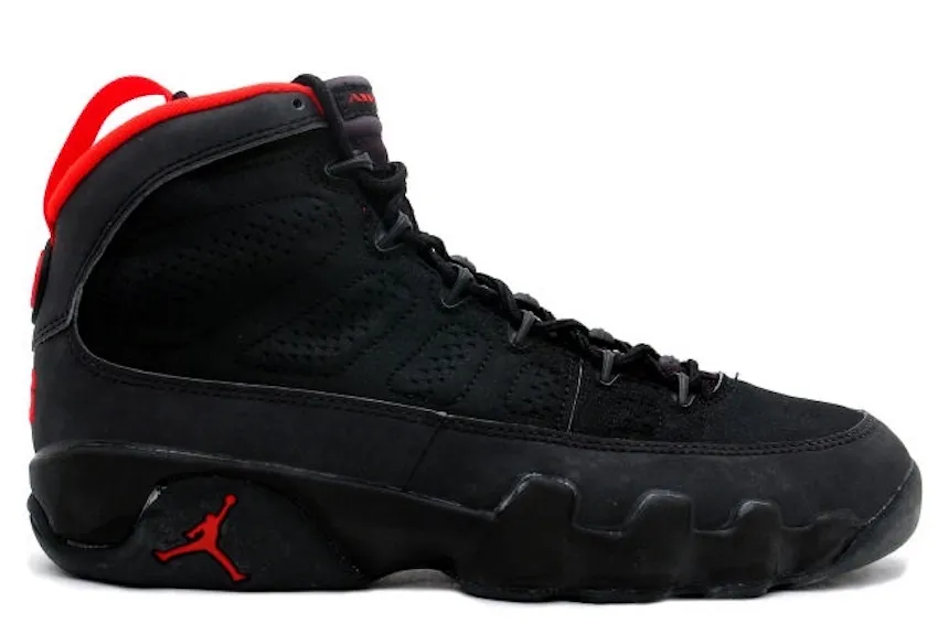 lateral view, black suede upper with red collar and red Jumpman logo, Charcoal