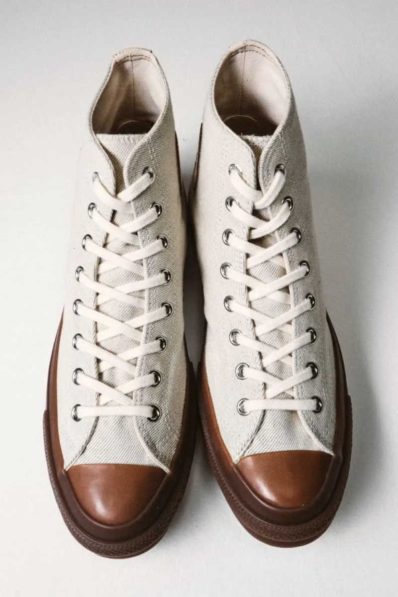 top-down pair, cream twill uppers with cream laces and brown toe caps, Natural
