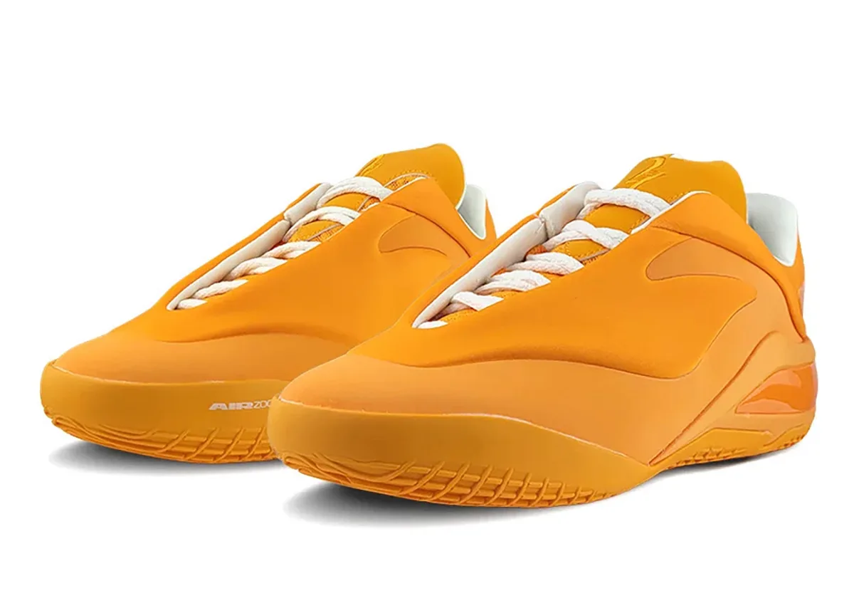 front three-quarter pair view, orange uppers with white laces and light blue heel tab, Creamsicle