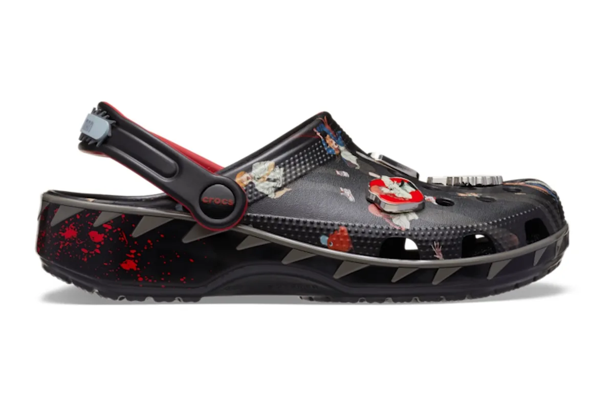 lateral view, black clog with allover character print and red splattered sole, Classic Clog Collection
