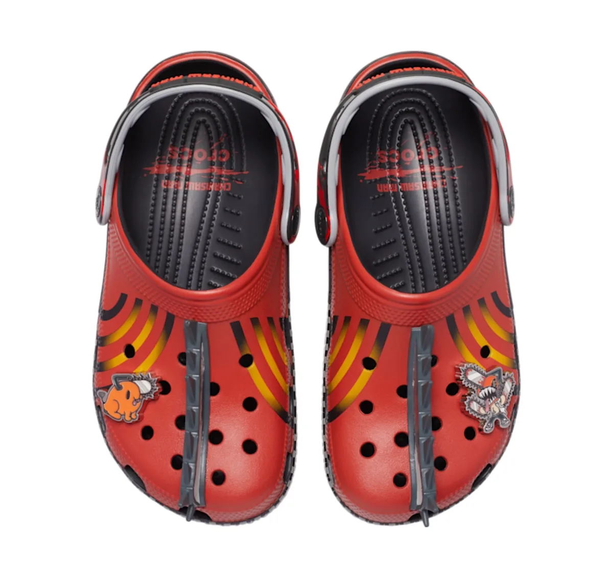 top-down pair, red clogs with black-yellow striped print and demon charm, Classic Clog Collection