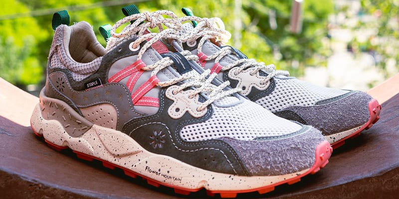pair on ledge, green trees behind, speckled midsole and red outsole, Staple Yamano 3
