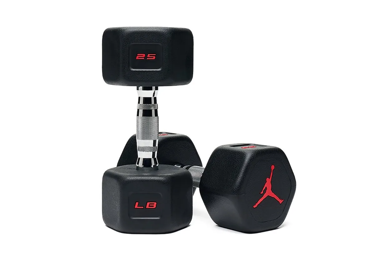 pair of black hex dumbbells with red Jumpman logo and chrome handle, Jordan Strength Collection