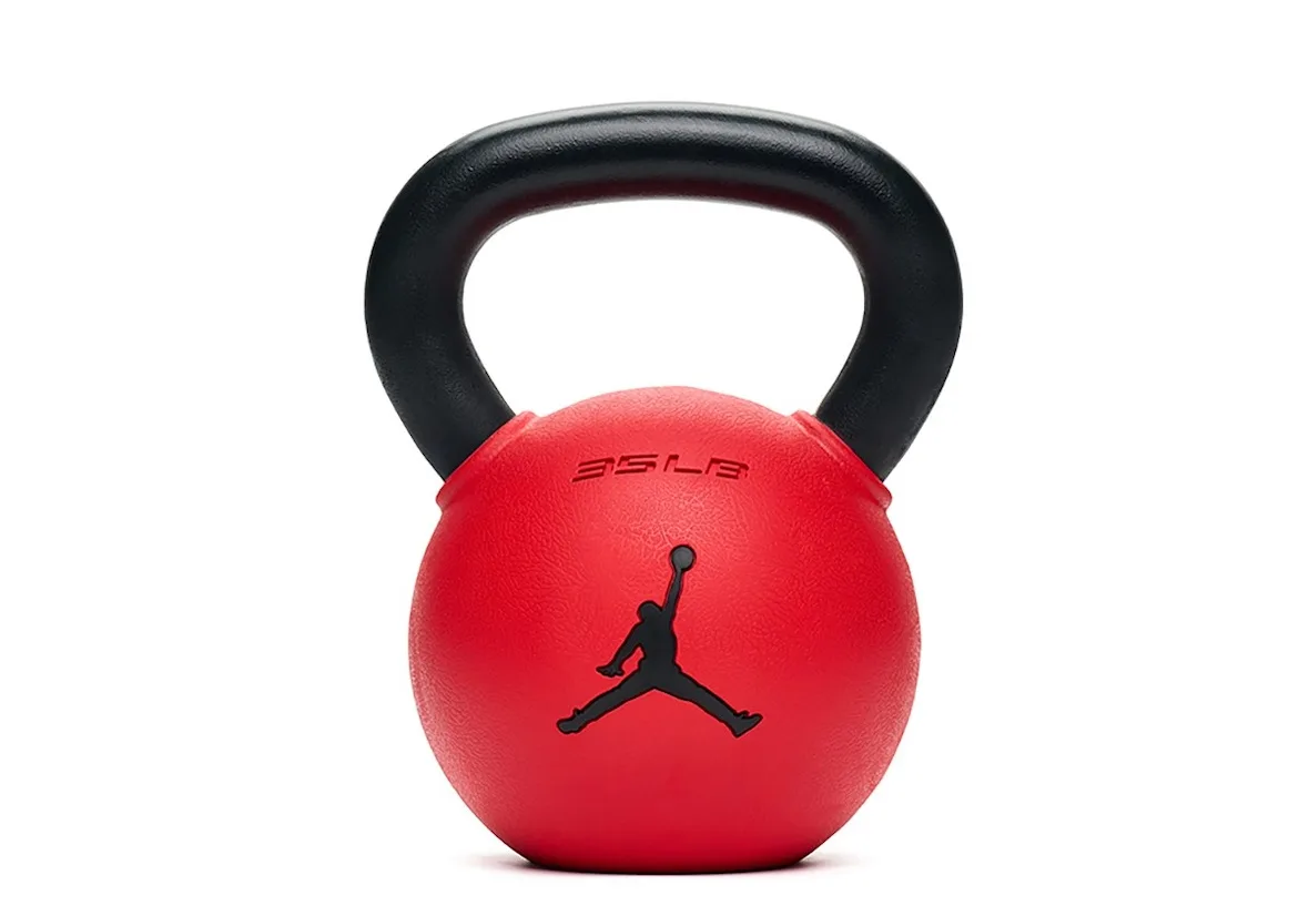 red kettlebell with black handle and Jumpman logo, 35LB marking, Jordan Strength Collection