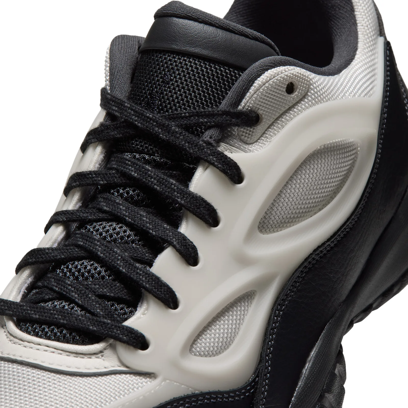 close-up of toe area showing sail mesh cutouts and black lace eyelets, Sail/Black