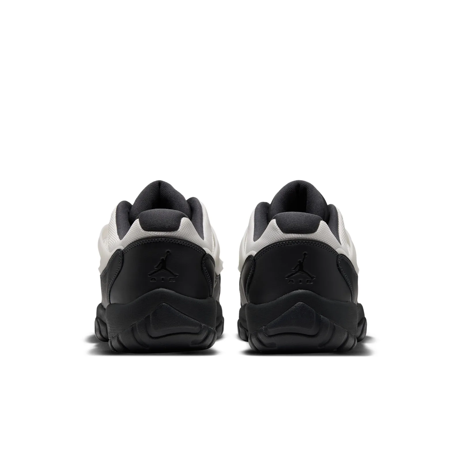 heel view of pair with black Jumpman logo on black heel counters, Sail/Black