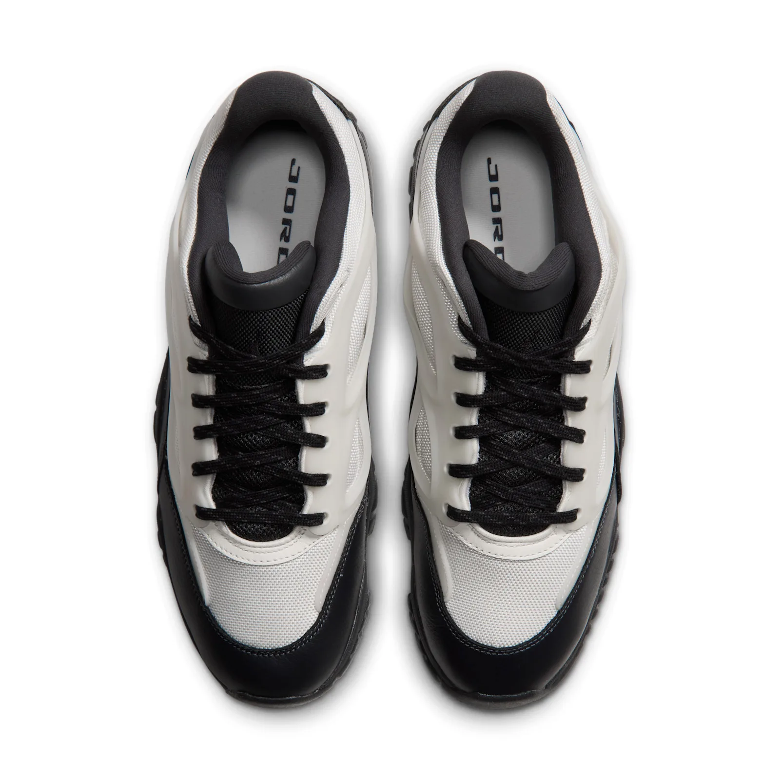 top-down pair view, black laces and Jordan wordmark on grey insoles, Sail/Black