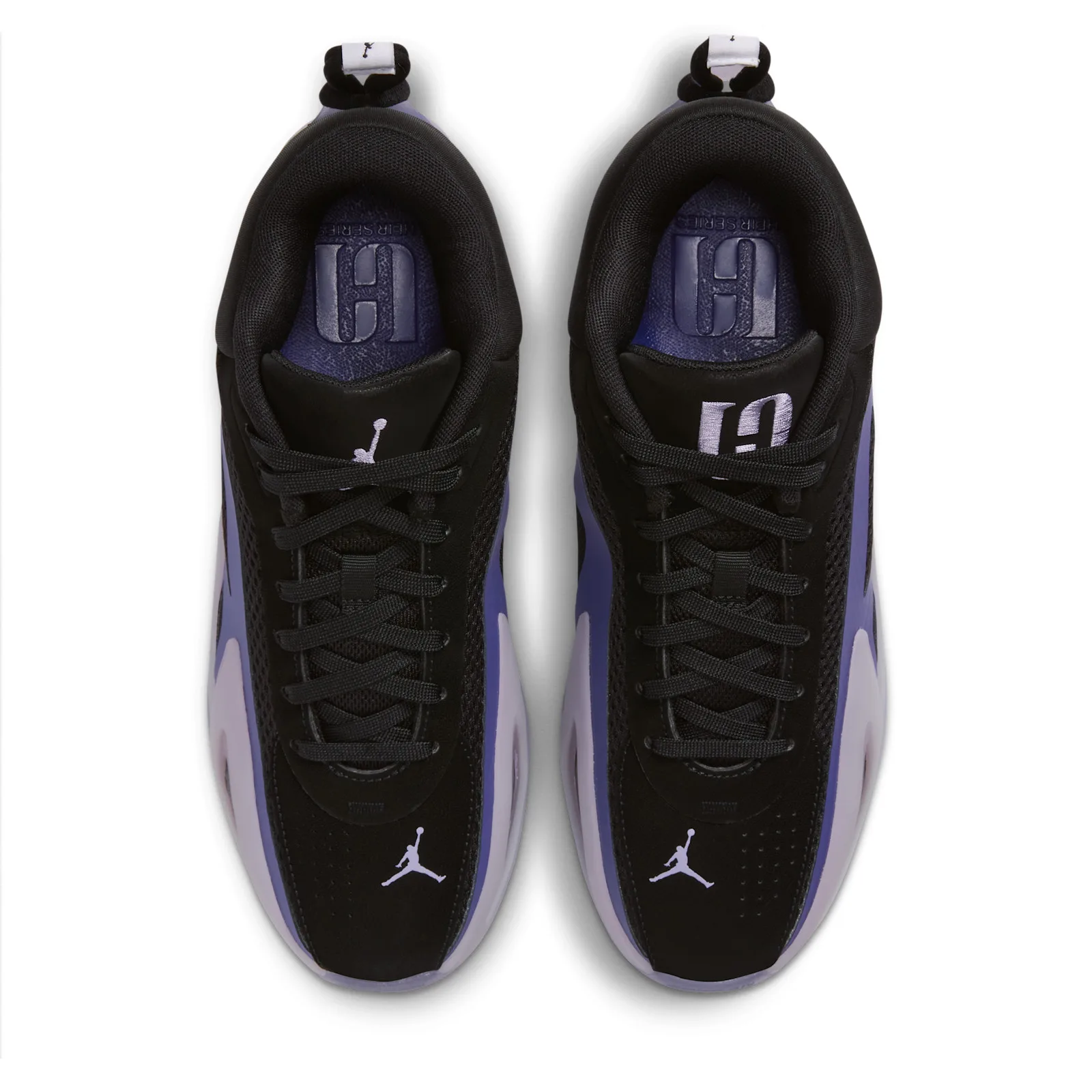 top-down view of pair, black laces, purple heir series text on tongues, Concord