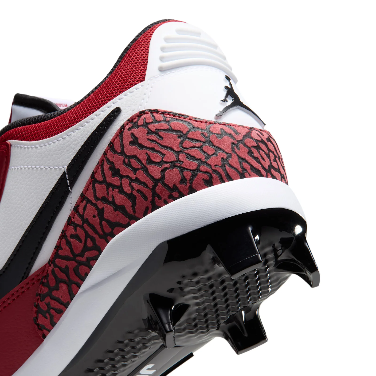 angled outsole close-up showing black cleats and white Jordan text, Chicago