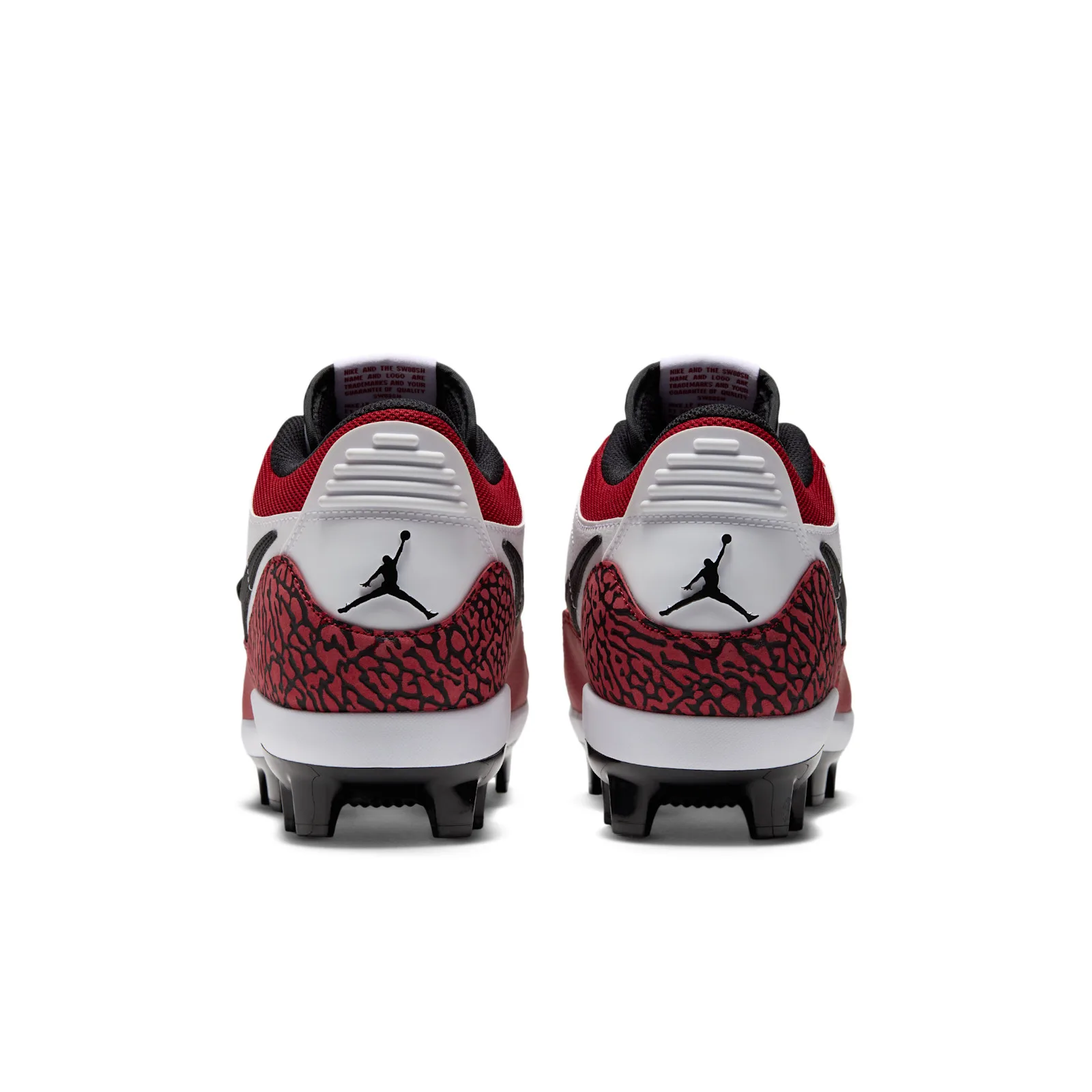 heel view of the pair showing black Jumpman logos on red elephant print overlays, Chicago