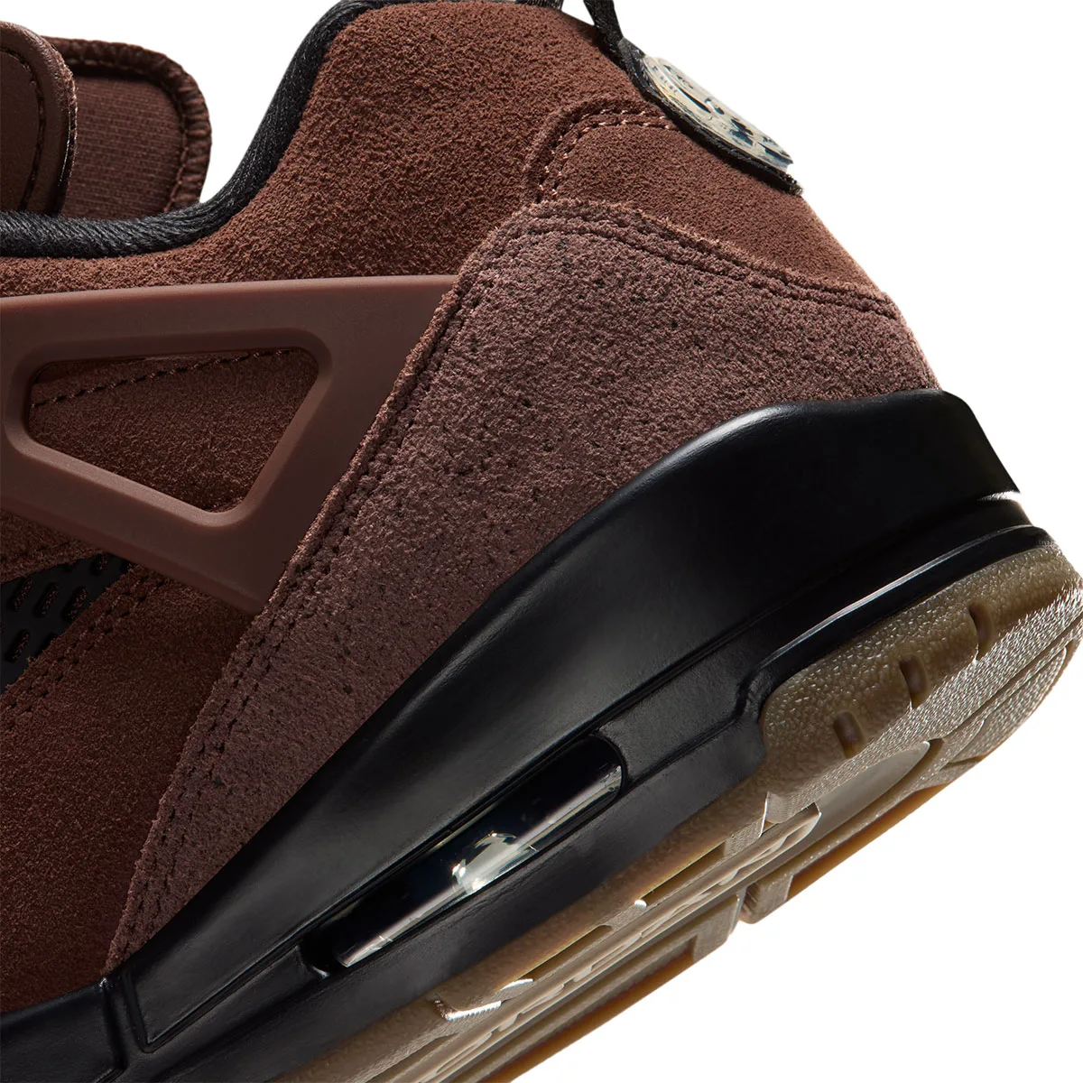close-up of heel and midsole, brown suede with black rand and gum tread, ike Low “Fauna Brown