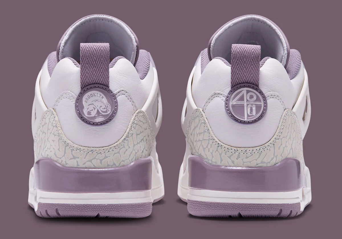 Heel view of pair showing Brooklyn and number 4 circular patches, Swan