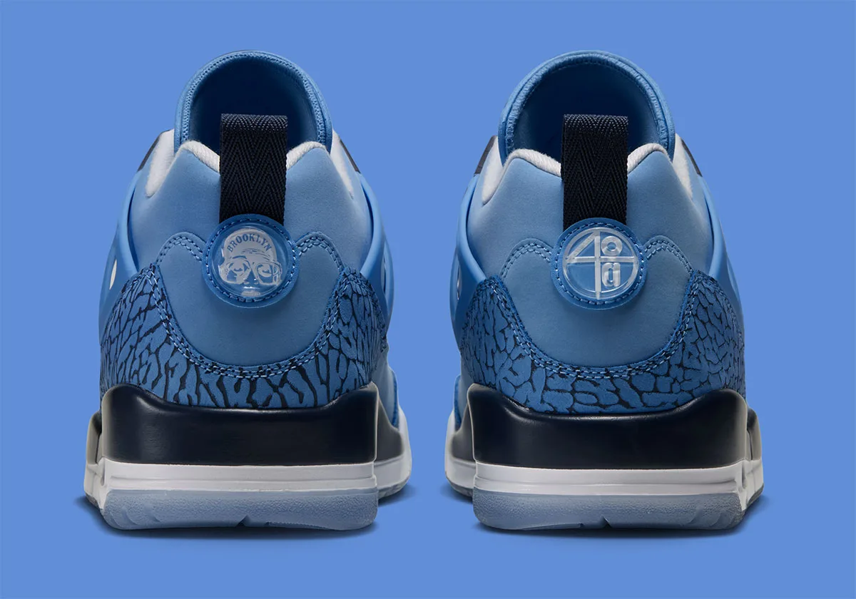 heel view of pair, navy elephant print with circular brooklyn and '4/20' pull tabs, UNC