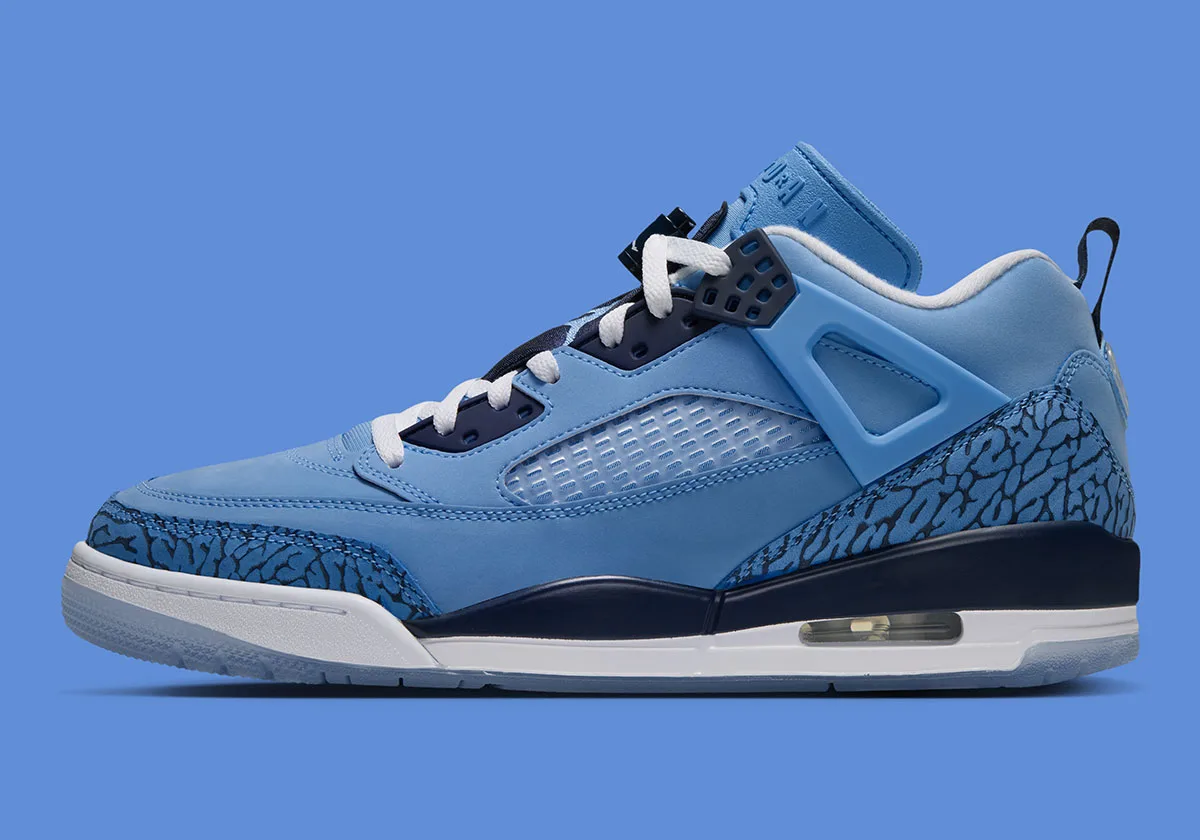lateral view, light blue upper, navy elephant print, translucent icy outsole, UNC