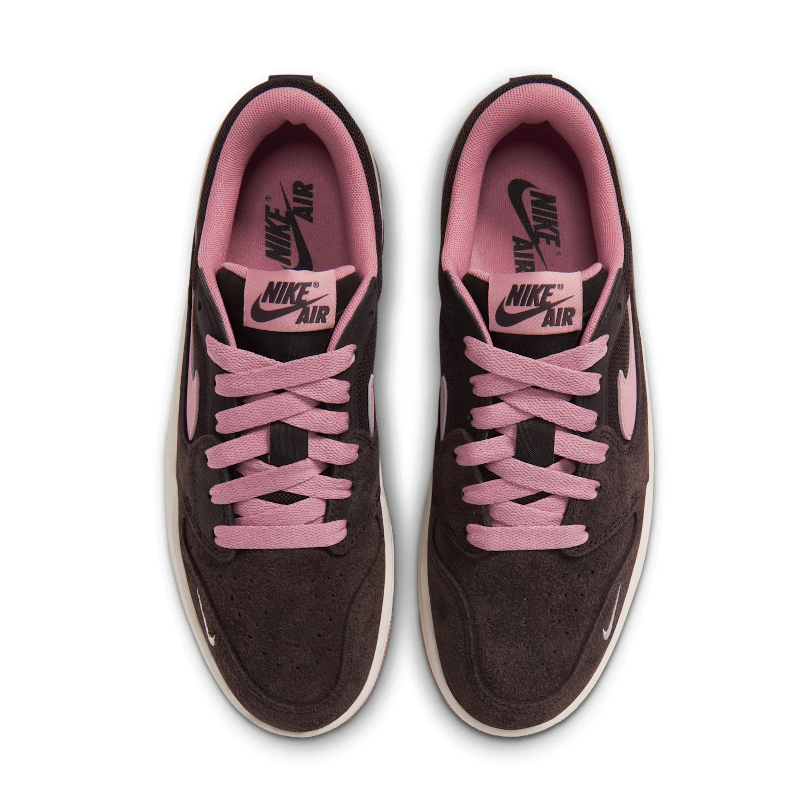Close-up heel and outsole, pink and burgundy tread, embossed Jumpman logo, Jordan Strada