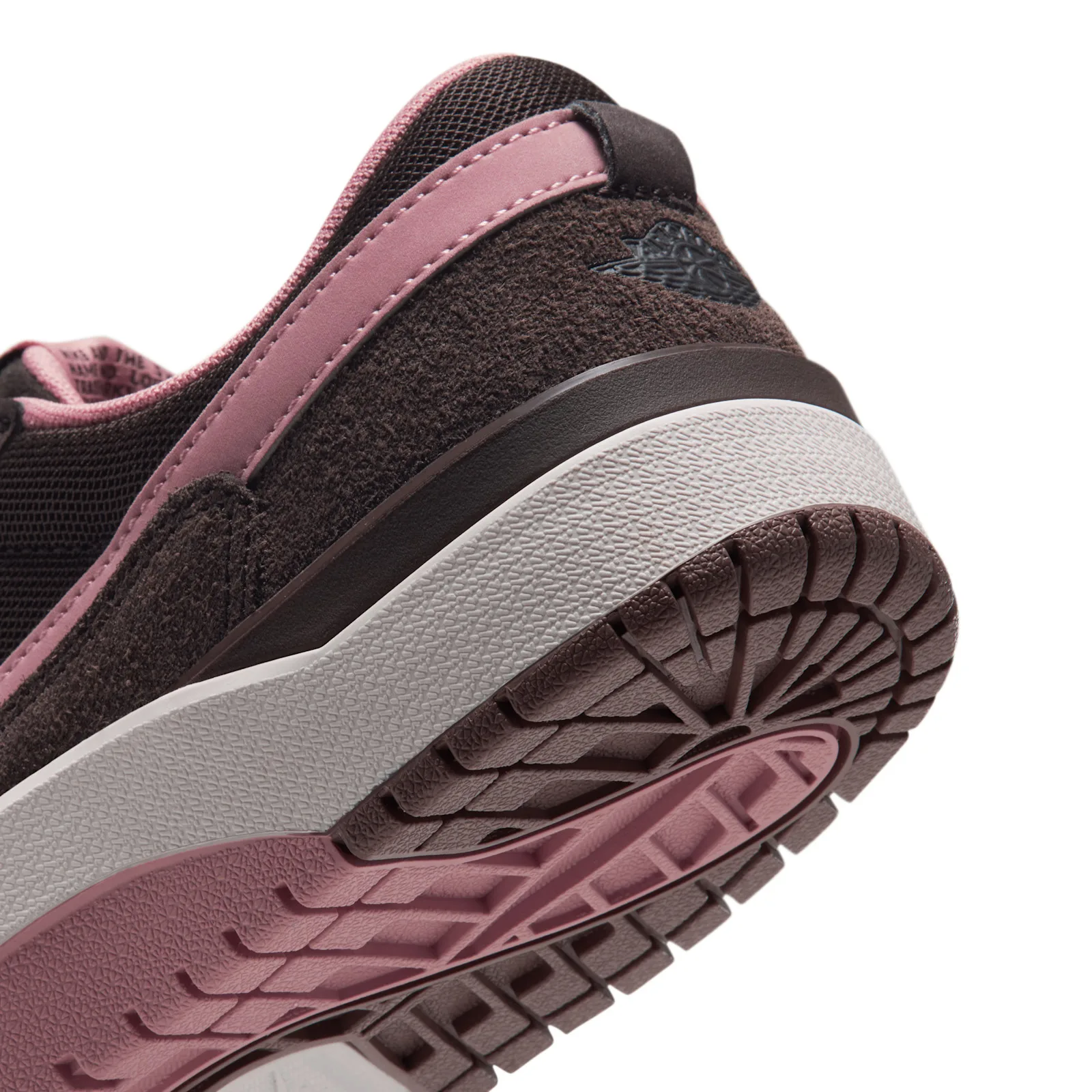 Pair, top-down view, pink crossed laces over black mesh panels, Jordan Strada
