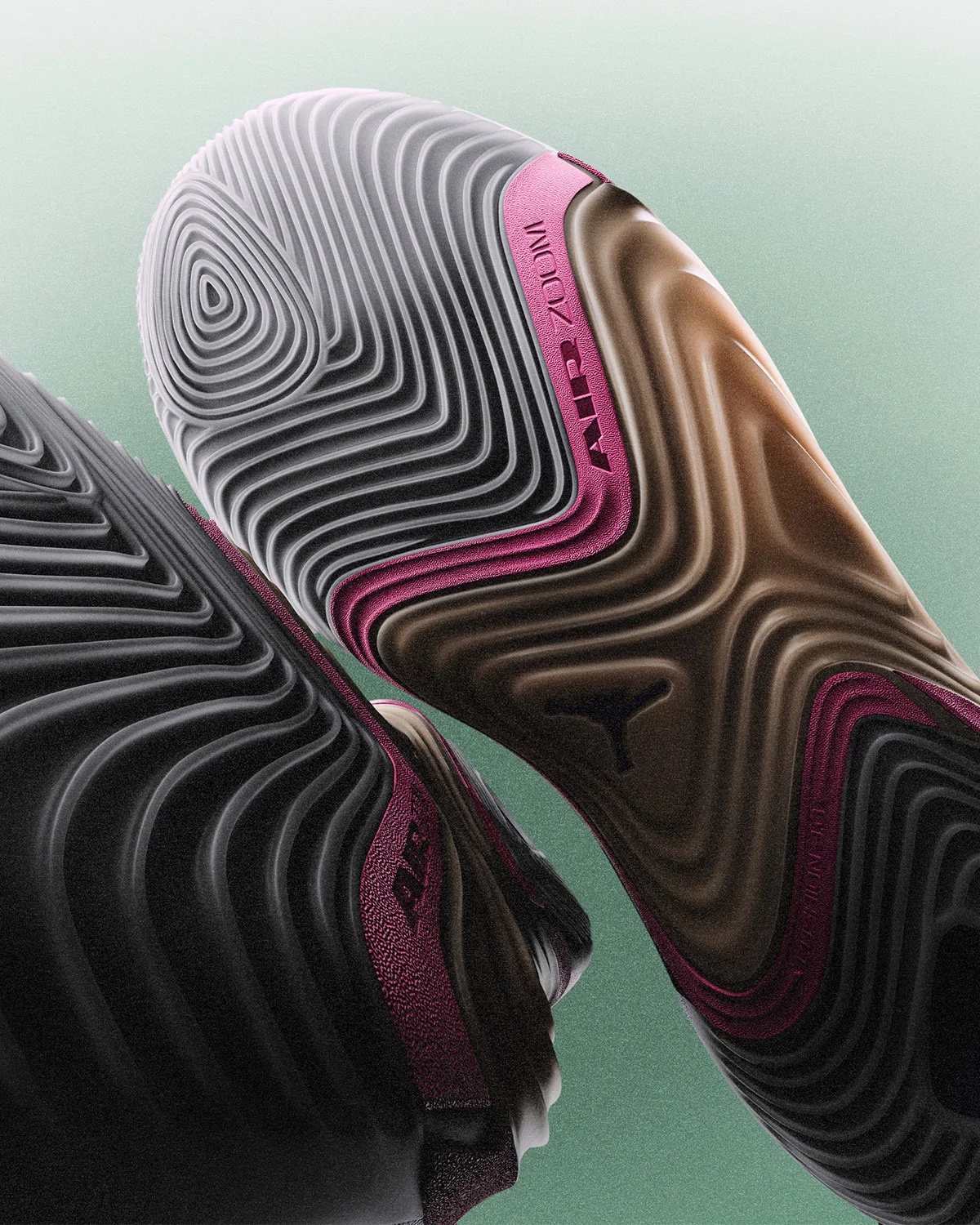 Outsole close-up, grey and maroon wavy tread with pink Air Zoom text, Jordan Tatum 5