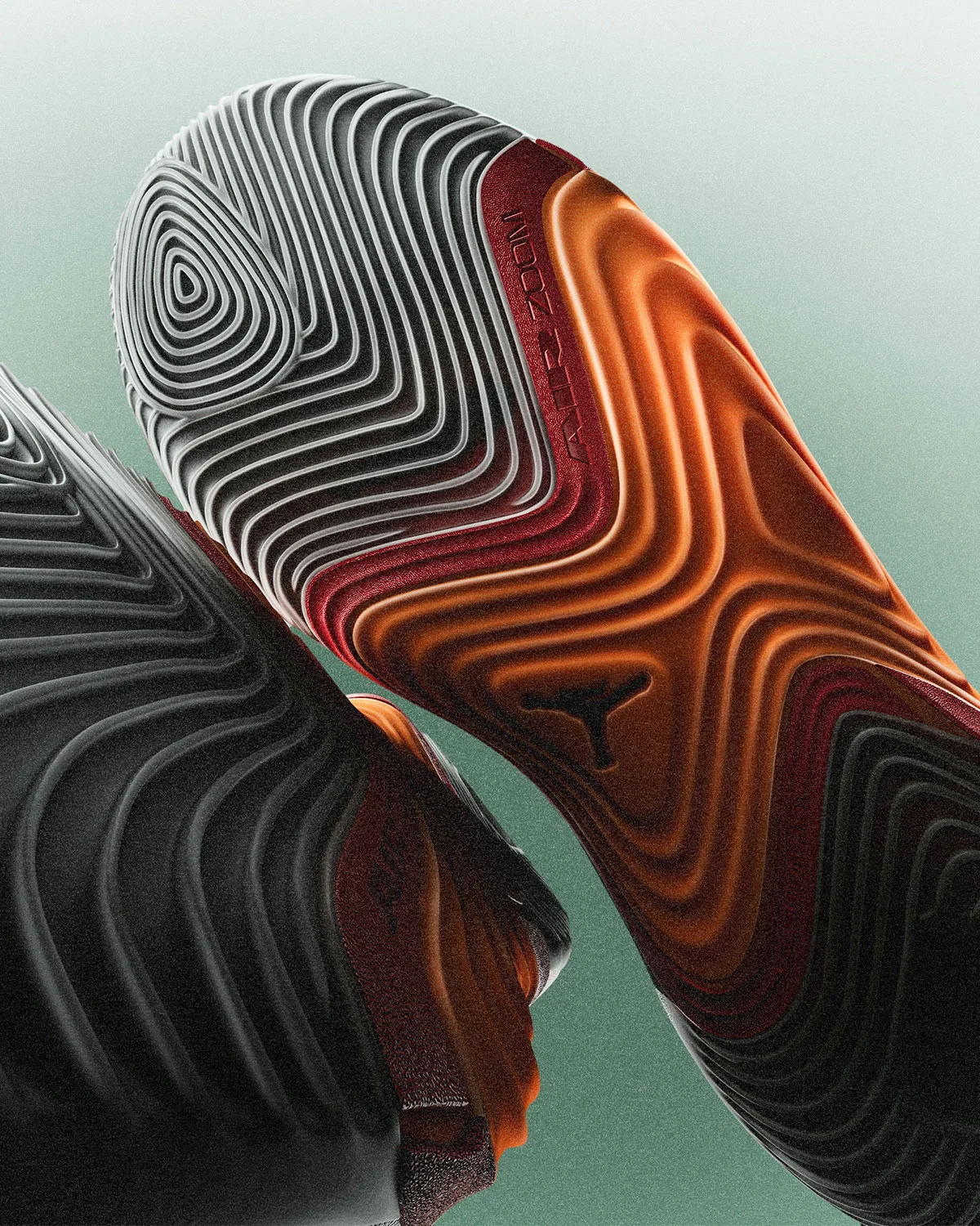 Outsole close-up, black and burnt-orange wavy tread with Jumpman logo, Jordan Tatum 5