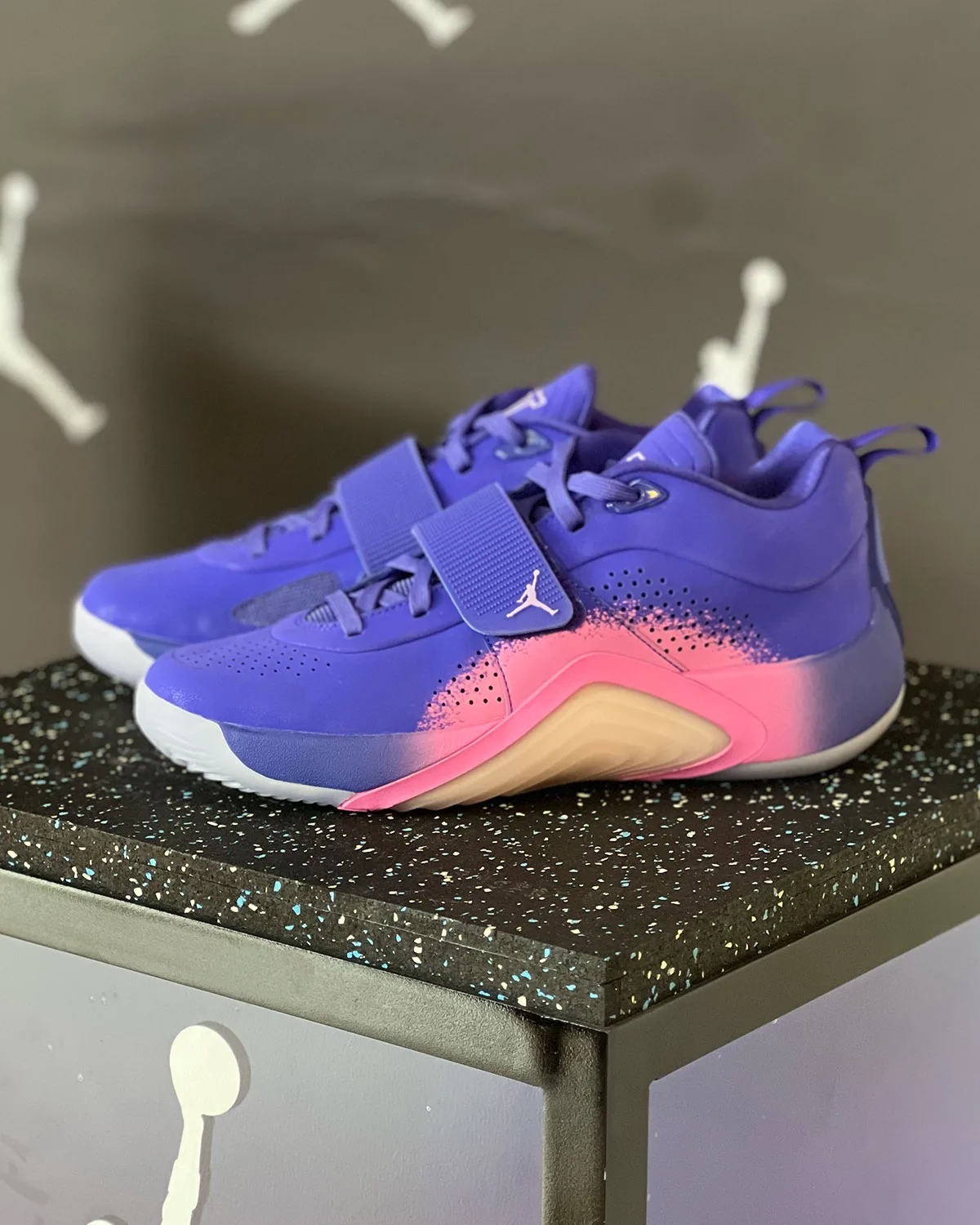 Lateral pair on speckled pedestal, purple upper with pink-tan gradient sole, Jordan Tatum 5