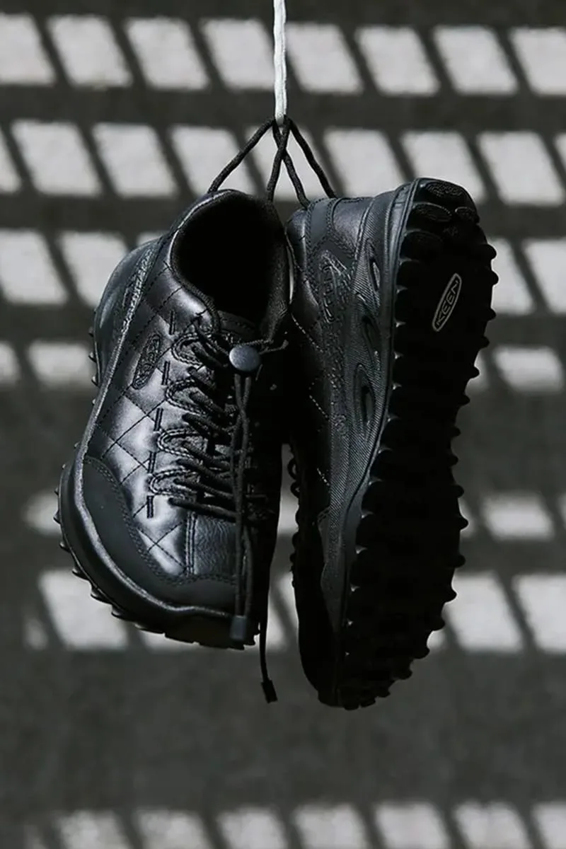 lateral pair hanging, black quilted panels and rugged black tread visible up close, DOE Jasper Zionic