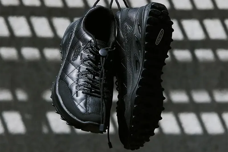 medial and lateral pair hanging against wire mesh, KEEN logo on heel and outsole, DOE Jasper Zionic