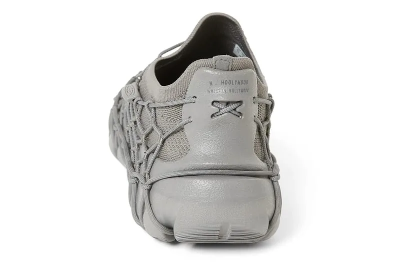 heel view, grey shoe showing N.HOOLYWOOD text and crossed lace toggles, x N.HOOLYWOOD COMPILE