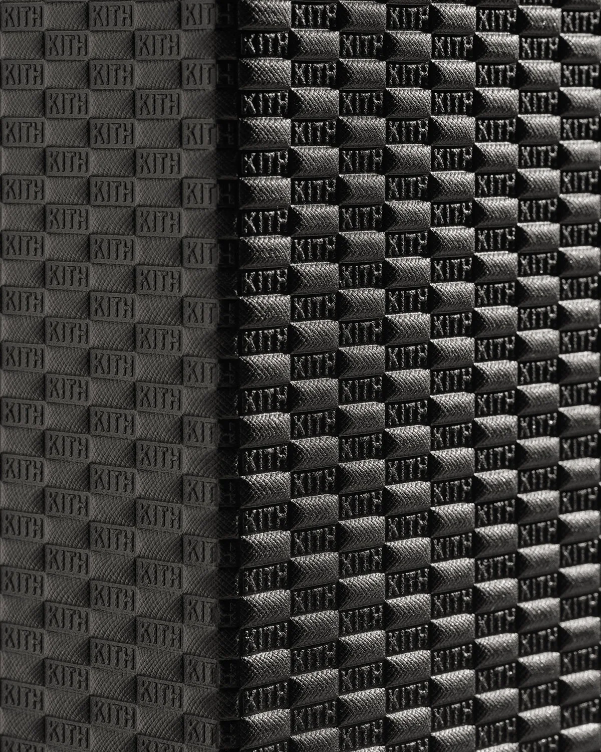 close-up of black slipcase surface with repeating embossed kith pattern, The Footwear Archive