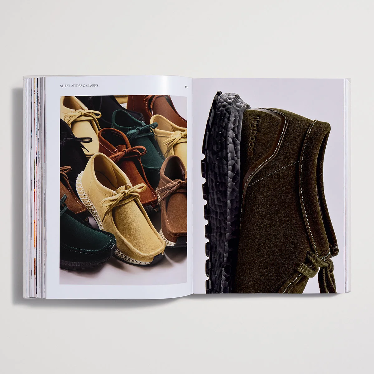 open spread of suede moccasins in tan, green and brown beside a ridged sole, The Footwear Archive