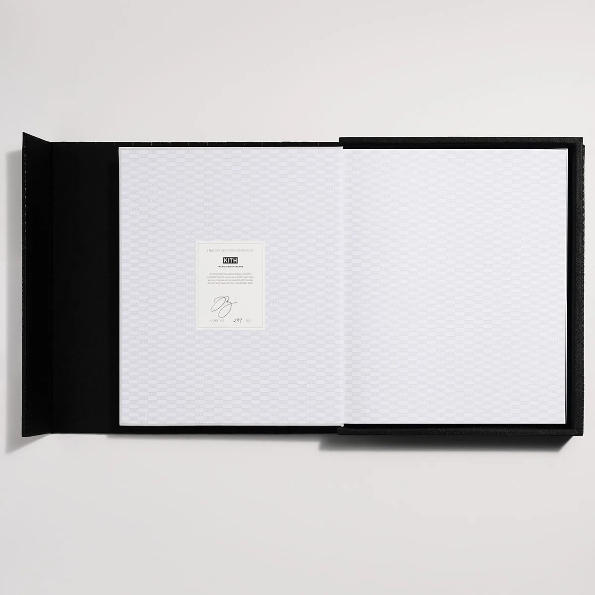 open cover page with black slipcase and signed kith footwear archive plate, The Footwear Archive