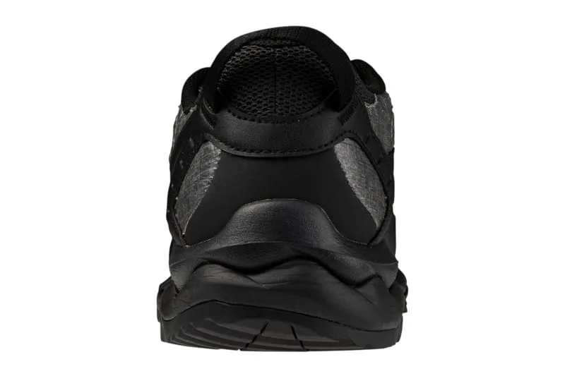 heel view: black ribbed counter above chunky wavy black outsole, Black